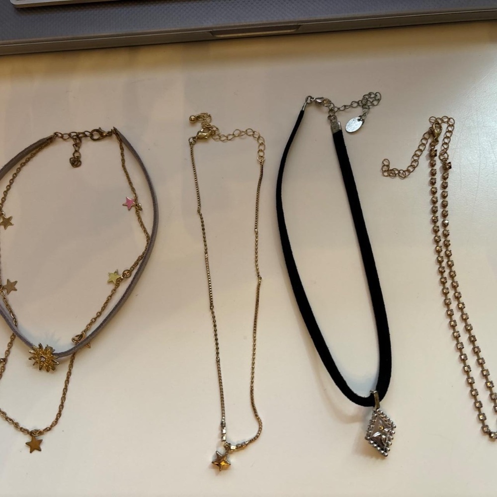 four neck chokers and bracelets